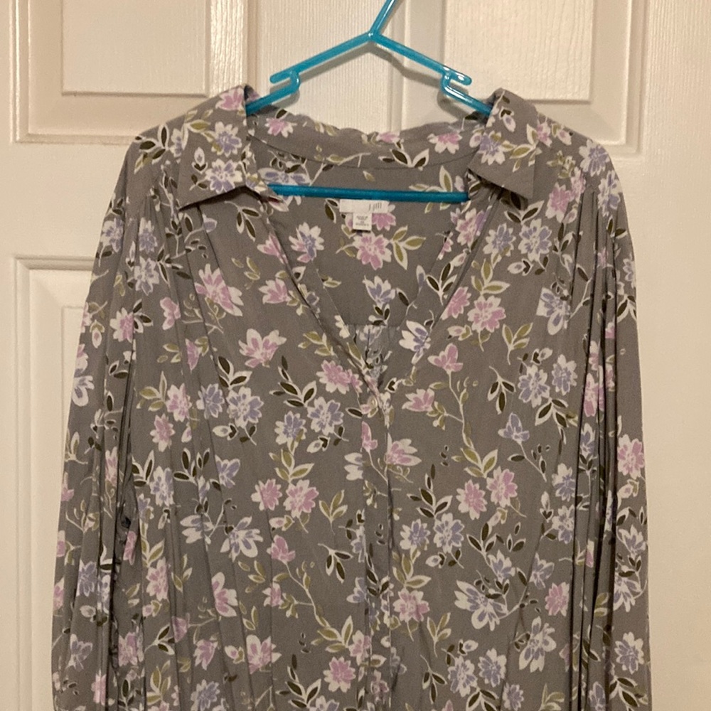 Three-quarter sleeve light rayon blouse with beautiful print if pale flowers